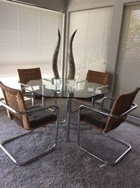 Modern Chromcraft  glass top table with lucite and horn accessories.