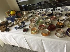 Many china cups and collectibles
