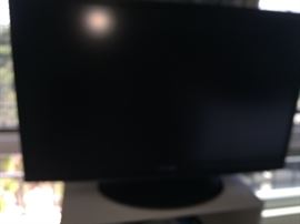 There are several large and medium size flat screen TVs