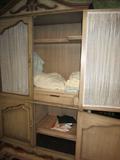 armoire retrofitted for tv,storage or bar