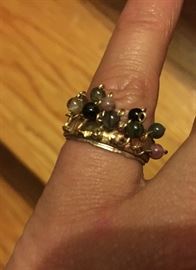 Custom designed sterling and 14K gold ring with various shades of jade balls.