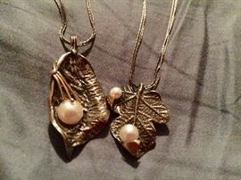 These are Sterling leaves, accented with 14 K and pearls