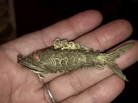 Antique vermeil articulated fish with coral eyes