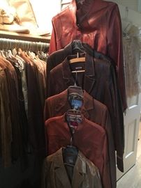 Dozens and Dozens of leather jackets and coats  - many with tags still attached