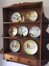 Charming shelf unit with hand painted plates.