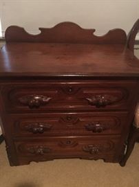 Walnut carved bed side table