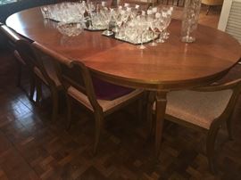 Beautiful dining room table with 8 matching chairs and additional leafs and table covers are included. "excellent condition"