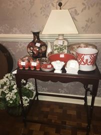 beautiful side server with a fine collection of oriental flavor glassware