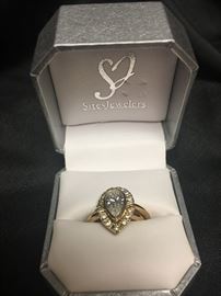 Pear cut 2.5 carrot diamonds "stunning"