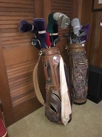 various golf clubs and bags and shoes and assortment of golf items