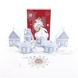 Wedgwood and Waterford Christmas Ornaments: A selection of eight ornaments by Wedgewood and Waterford. This selection includes a silver plated Five Golden Rings 2015 by Waterford. It also includes a silver plated Christmas star, a blue Iconic Urn, a blue Baby’s First Carousel, two blue Bless This Home, and two blue Dancing Hours teapots. Each piece is marked.
