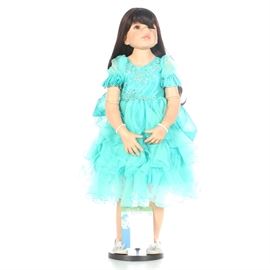Limited Edition "Jasmine" by Masterpiece Gallery: A limited edition “Jasmine” doll from Masterpiece Gallery. This limited edition doll is number 005/350 by artist Monika Levenig. This doll is presented in an aqua blue embroidered, ruffled and rhinestone dress with gray rhinestone embellished shoes, and ersatz pearl bracelets. This doll features ball joint hinges at the elbows and knees. A certificate of authenticity and the original box is presented with this doll.