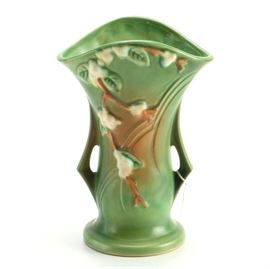 Roseville "Snowberry" Flared Vase: A Roseville Snowberry flared vase. The art pottery vase in the Roseville “fern green” finish with flowering branches features a wide rim and two side handles. The underside is marked, “Roseville USA 1V2-9.”