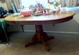 Nice Oak Pedestal Table-Shown with leaf in-It's round when leaf is out