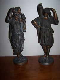 Cast metal statues