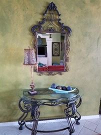 Iron claw foot entry table and mirror.