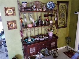 Large bakers rack full of collectibles