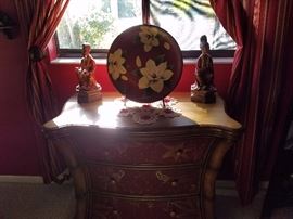 Nice bombay chest of drawers with ceramic mr. and mrs. Asian figurines.