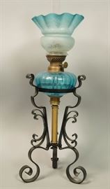 Lot 171 Black Iron Base Oil Lamp. Blue glass shade and we