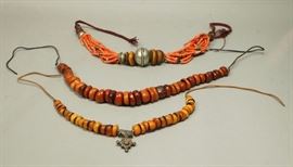 Lot 553 3pcs Tribal Beaded Necklace. 1. Large amber bead