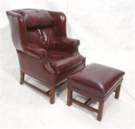 Lot 344 Burgundy Leather Overstuffed Wing Chair Ottoman. 