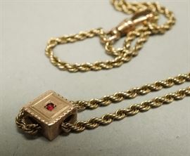 Lot 571 14K Gold Slide Chain. Diamond form slide with sma