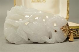 Lot 605 MINGS 14K Gold Carved Jade Pendant. Carved plum