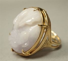Lot 606 MINGS 14K Gold Carved Lavender Jade Ring. Carve
