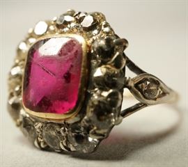 Lot 610 Gold Pink Glass Ladies Ring. Framed with mall dia