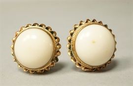 Lot 627 14K Gold Large Domed Pale Coral Earrings. Twisted