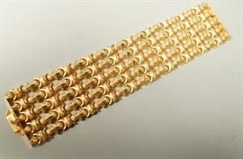 Lot 628 18K Gold Wide Link Bracelet. Sculptural design wi