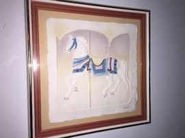 Series of three embossed prints named  "Carousel" by Wess.