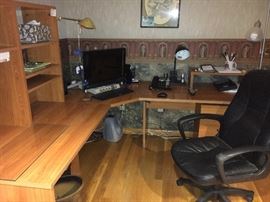 Wonderful corner desk system, computer not for sale. Desk includes shelving on the left and file that slips underneath.