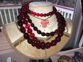 Strand of great red beads along with the amber