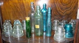 glass Regulter insulators.  glass vases and containers