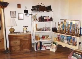 antique chest with marble top. Handbags and scarves. CAndles and candlesticks.