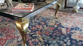 Heavy glass square coffee table with brass legs