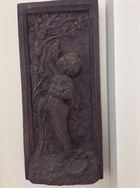 Carved wall hanging.
