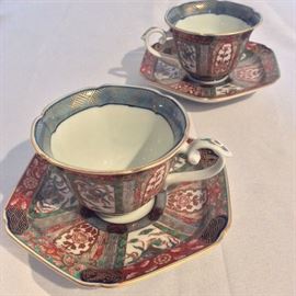 Pair of Japanese Imperial cups and saucers. 