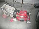 Toro lawnmower w/ grass catcher.