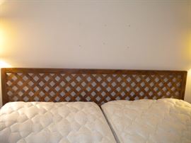 Henerdon bedroom furniture dresser and two mirrors, chest with amoire, 2 night stands and headboard. Two twin bed mattresses,box springs, frame. Makes in to a king.