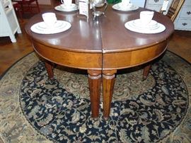 Round Table that is 2 Demi-Lunes