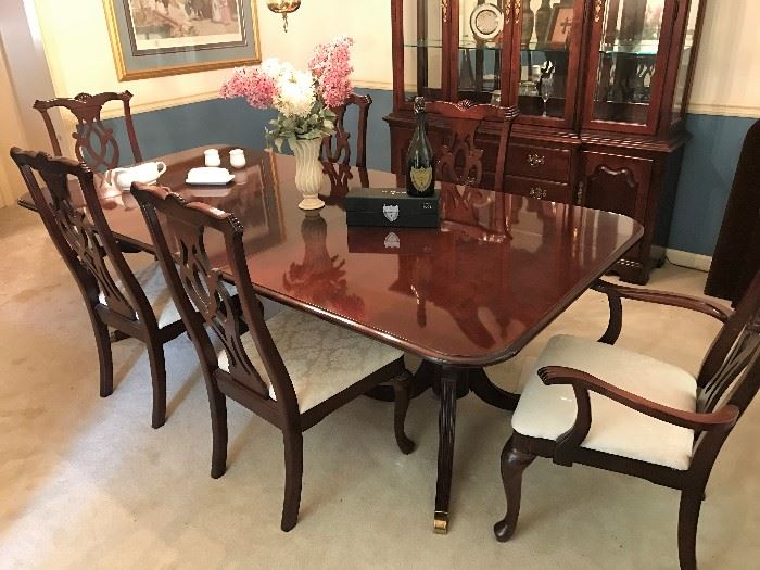 Thomasville Banquet size 110" includes both leaves. Cherry Dining Room table and 6 chairs.  Excellent Condition.  Thomasville China Cabinet.  