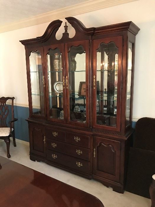 Thomasville cherry cabinet with beveled glass.