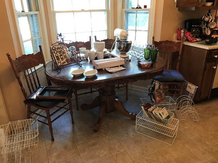 Kitchen Table and 4 chairs.  Kitchen Aid Mixer, etc.