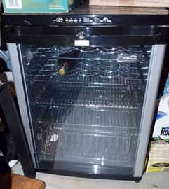 wine refrigerator with temp.gauge on door