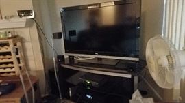 4 flat screen tvs