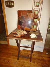 end table, leather pillow, turtles 