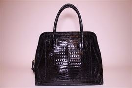 Nancy Gonzalez black crocodile tote. Slightly used. Retails $3750+. STARTING BID: $450 -- FIND MORE ITEMS ON OUR LIVE AUCTION WEBSITE! 