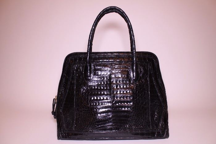 Nancy Gonzalez black crocodile tote. Slightly used. Retails $3750+. STARTING BID: $450 -- FIND MORE ITEMS ON OUR LIVE AUCTION WEBSITE! 